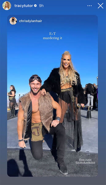 Tracy Tutor and her boyfriend Erik Anderson wearing halloween costumes at a party together.