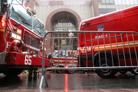 New York City Fire Department (FDNY) trucks outside 787 7th Avenue in midtown Manhattan where helicopter crashed in New York