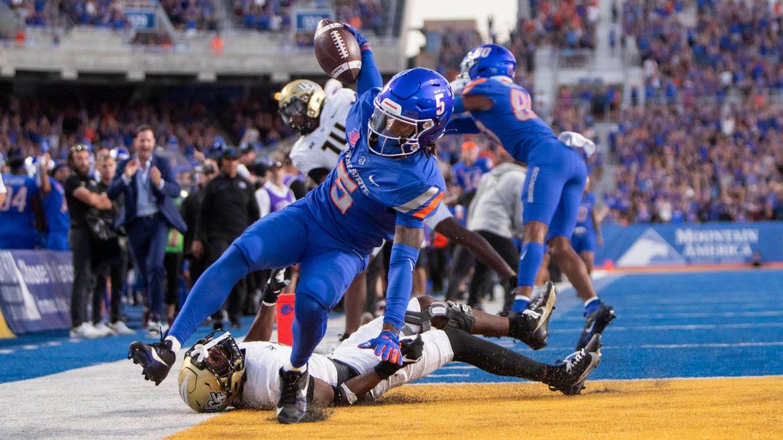 Boise State wide receiver Stefan Cobbs scores a touchdown off of a pass from quarterback Maddux Madsen late in the 4th quarter against UCF in the Broncos’ home opener, Saturday, Sept. 9, 2023. The go-ahead touchdown wasn’t enough. The Knights kicked a field goal to win the game 18-16.