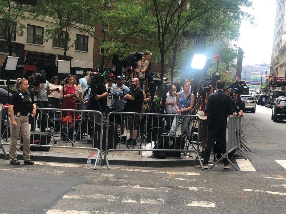 An international press corps awaits the end of former President Donald Trump's deposition before the New York attorney general's office.