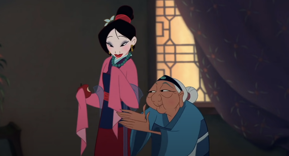 mulan in traditional chinese dress with her grandmothre