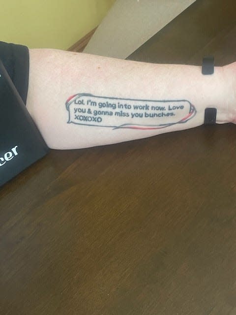 Sara Montague McFarland shows the tattoo she got of the final text message she received from her husband, Anamosa State Penitentiary corrections officer Robert McFarland
