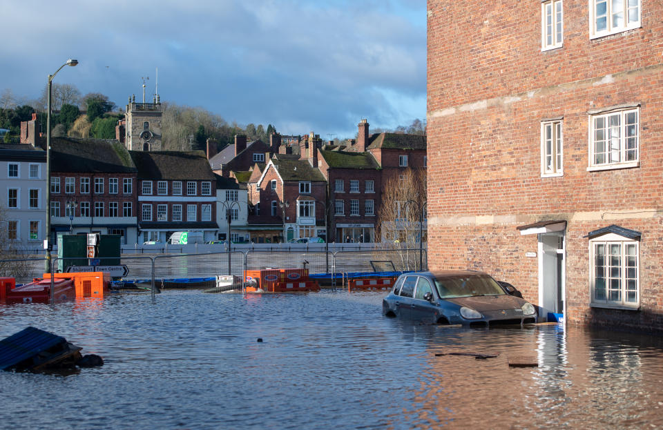 A car in flooded water Flood defences in Bewdley, Worcestershire, as the River Severn remains high, with warnings of further flooding across the UK.