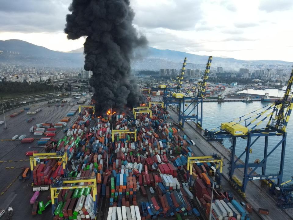 Black smoke from a fire is seen at the Iskenderun port after an earthquake in Iskenderun, Turkey (via REUTERS)
