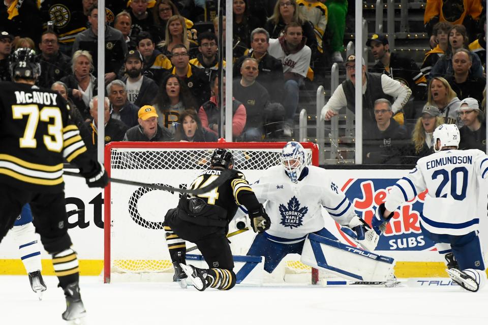 Boston Bruins left wing Jake DeBrusk (74) scores his second goal of the game past Toronto Maple Leafs goaltender Ilya Samsonov (35) during the second period.