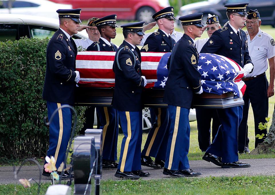 The U.S. Army Honor Guard carries the casket of Pfc. Sanford Keith Bowen, whose remains were recently identified and returned home.