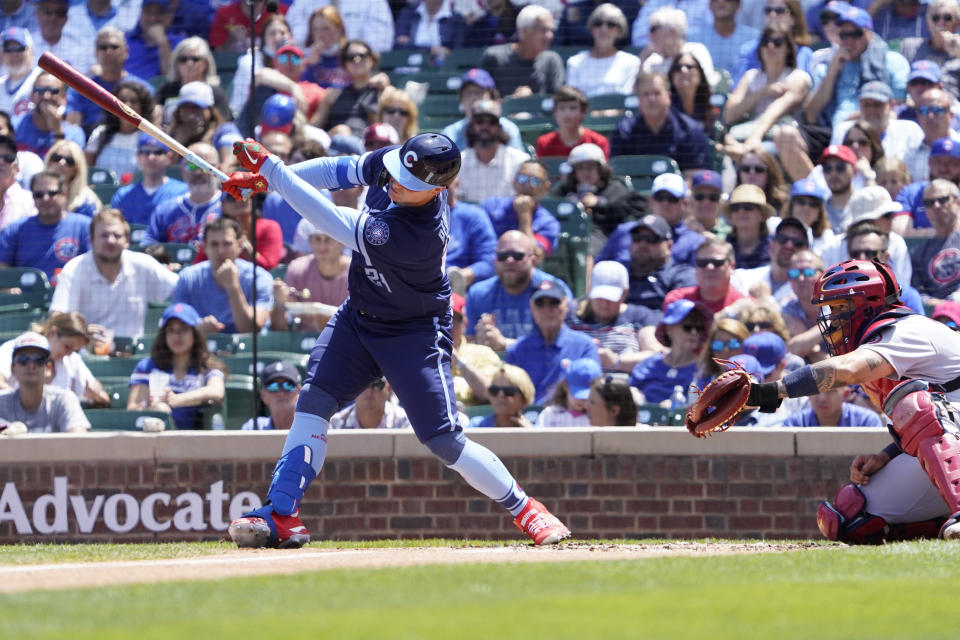 Chicago Cubs' Joc Pederson (24) hits a three-run double against the St. Louis Cardinals during the first inning of a baseball game, Friday, July 9, 2021, in Chicago. (AP Photo/David Banks)