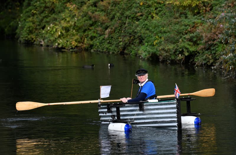 80-year old military veteran Stanley rows homemade boat named the "Tintanic" to raise funds for charity St Wilfrid's Hospice, in Chichester
