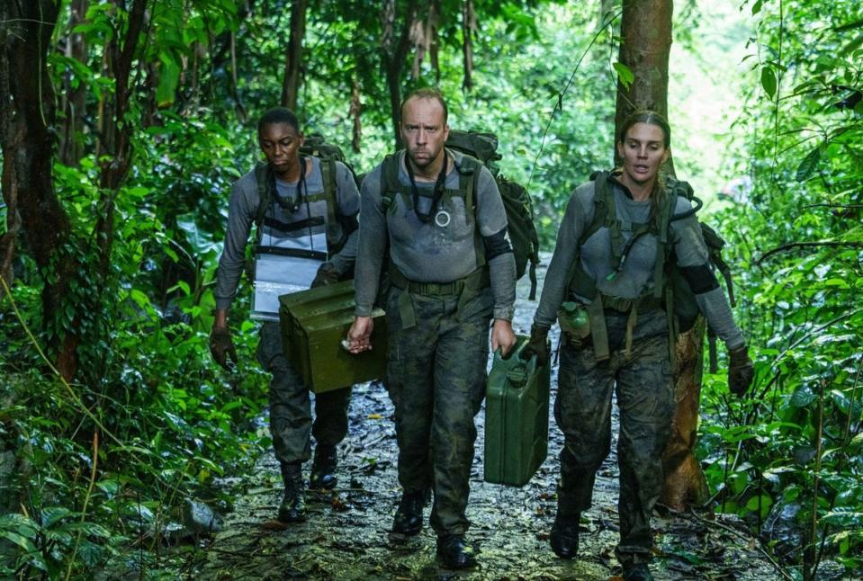 Hancock doing jungle navigation with his fellow contestants (Channel 4)