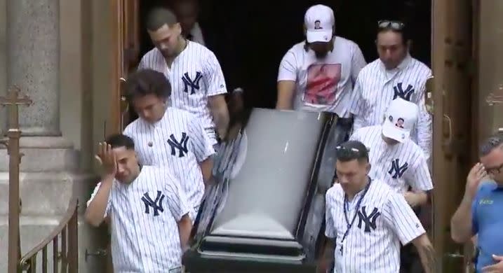 Pallbearers, most wearing matching New York Yankee jerseys, carry the casket at the funeral service on Wednesday for Guzman-Feliz. (Photo: Facebook/Pix11)