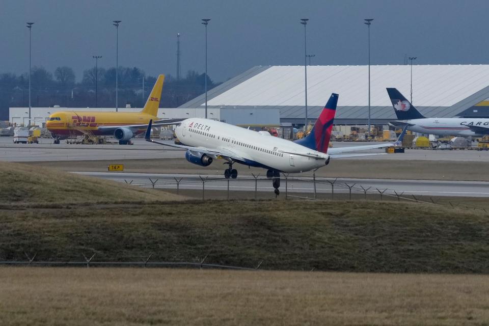 A Delta 737-800 takes off at Cincinnati/Northern Kentucky International Airport in Hebron, Ky., on Wednesday, Jan. 11, 2023. Flight operations across the nation were affected Wednesday morning after Federal Aviation Administration reported a system failure.