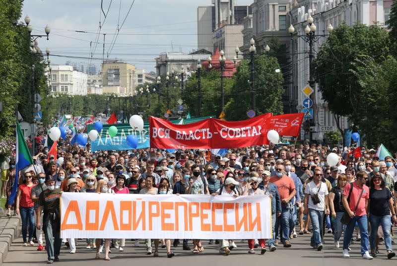 People take part in a rally in support of former regional governor Sergei Furgal in Khabarovsk