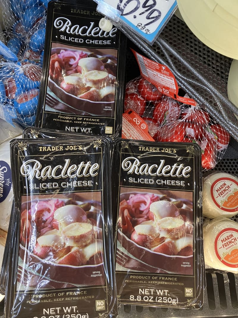 black bags of raclette sliced cheese