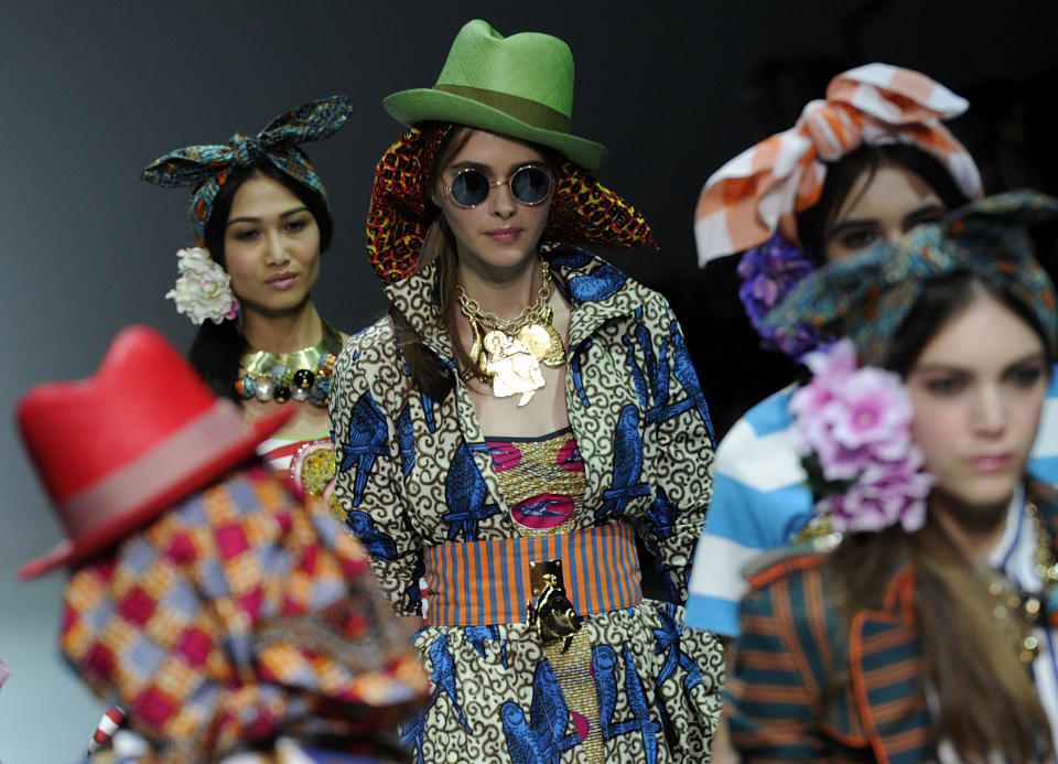 Models wear creations for Stella Jean's women's Spring-Summer 2014 collection, part of the Milan Fashion Week, unveiled in Milan, Italy, Saturday, Sept. 21, 2013. (AP Photo/Giuseppe Aresu)