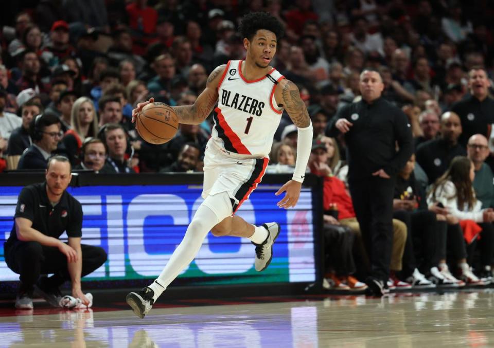 Portland Trail Blazers guard Anfernee Simons (1) dribbles the ball against the Los Angeles Clippers in the second half on March 19, 2023, at Moda Center in Portland, Oregon.