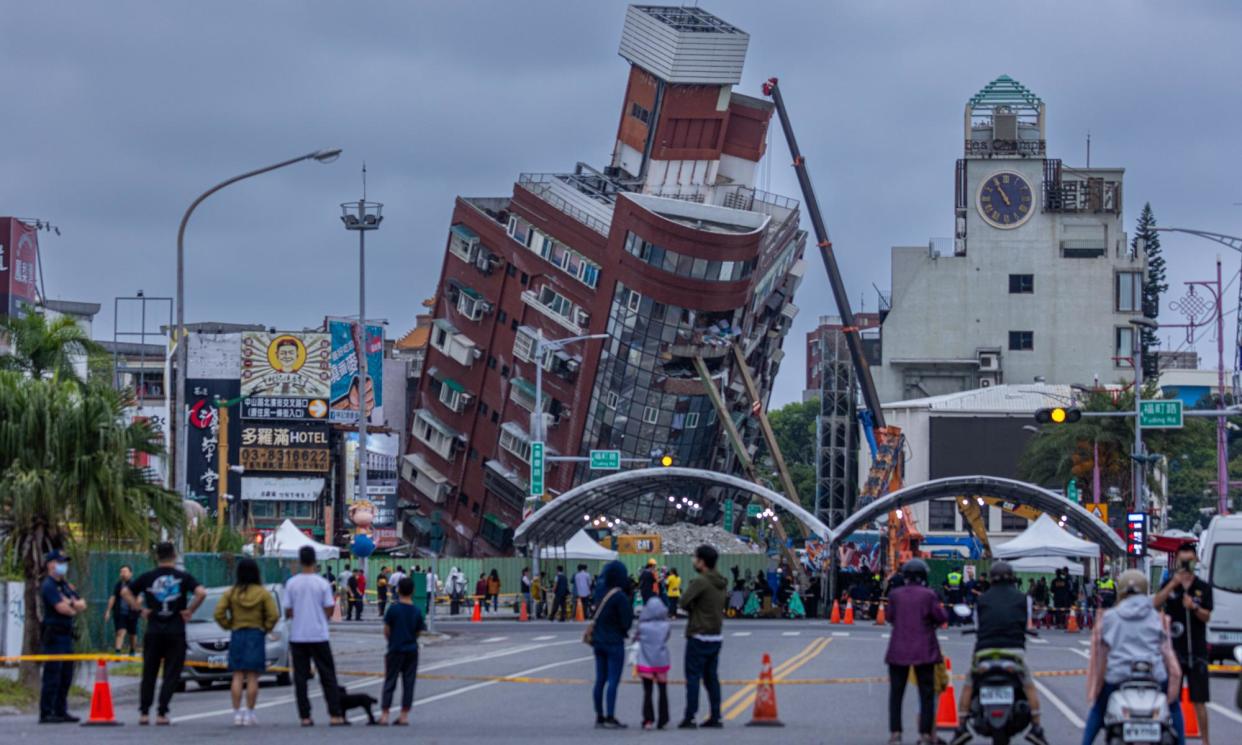 <span>A collapsed building in the city of Hualien on the east coast of Taiwan, where an earthquake with a 7.4 magnitude hit on Wednesday morning. </span><span>Photograph: Annabelle Chih/Getty Images</span>