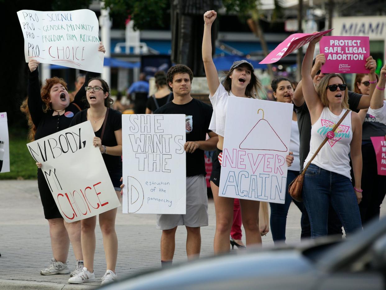 Demonstrators chant slogans during a rally in support of abortion rights in Miami, Florida.