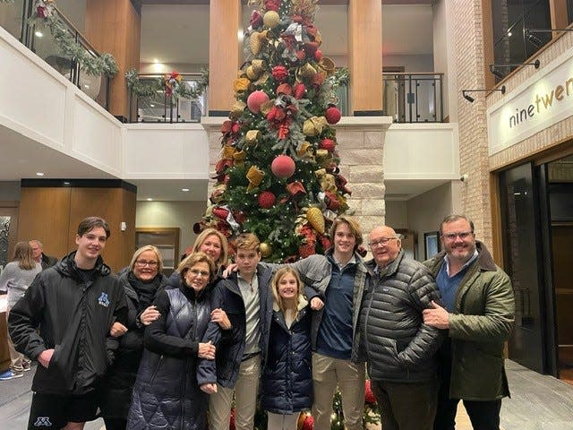Larry Whipple (second from right) has now survived five years since his diagnosis with advanced lung cancer. He's pictured last Christmas with his extended family.