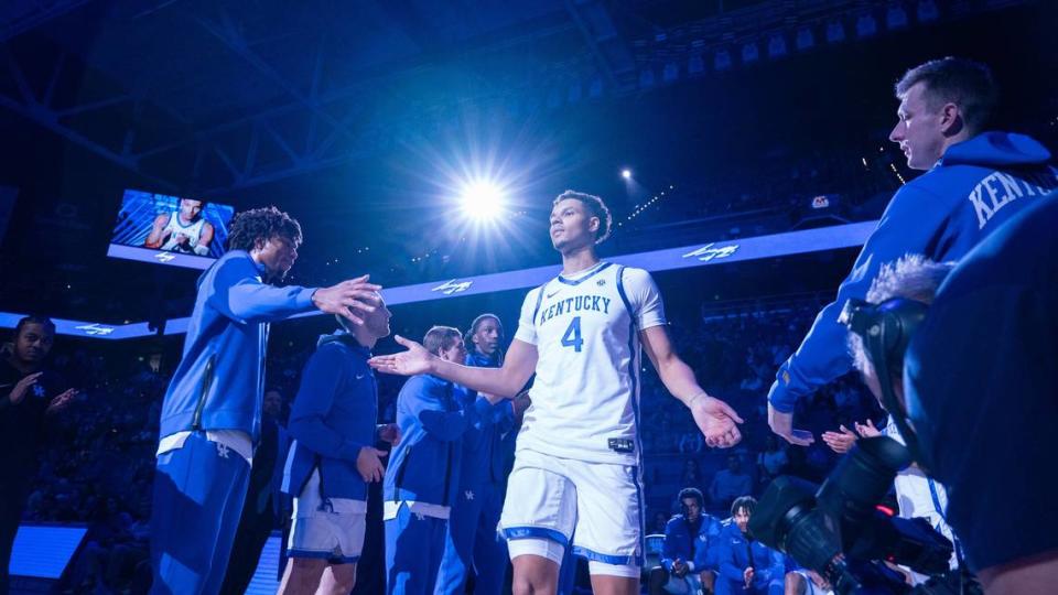 Kentucky forward Tre Mitchell (4) UK was introduced as a starter in Rupp Arena for the first time before the Wildcats defeated Georgetown 92-69 last Friday in an exhibition game. The transfer from West Virginia led the Cats with 22 points and nine rebounds vs. Chris Briggs’ Tigers.