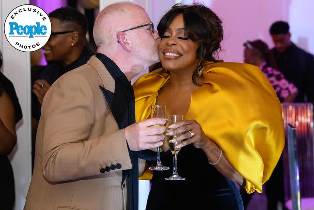 <p>Earl Gibson</p> Ryan Murphy and Niecy Nash