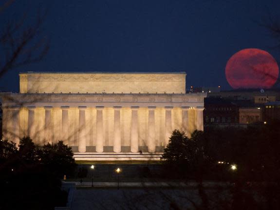 The full moon is seen as it rises near the Lincoln Memorial, Saturday, March 19, 2011, in Washington. The full moon tonight is called a super perigee moon since it is at its closest to Earth in 2011. The last full moon so big and close to Earth