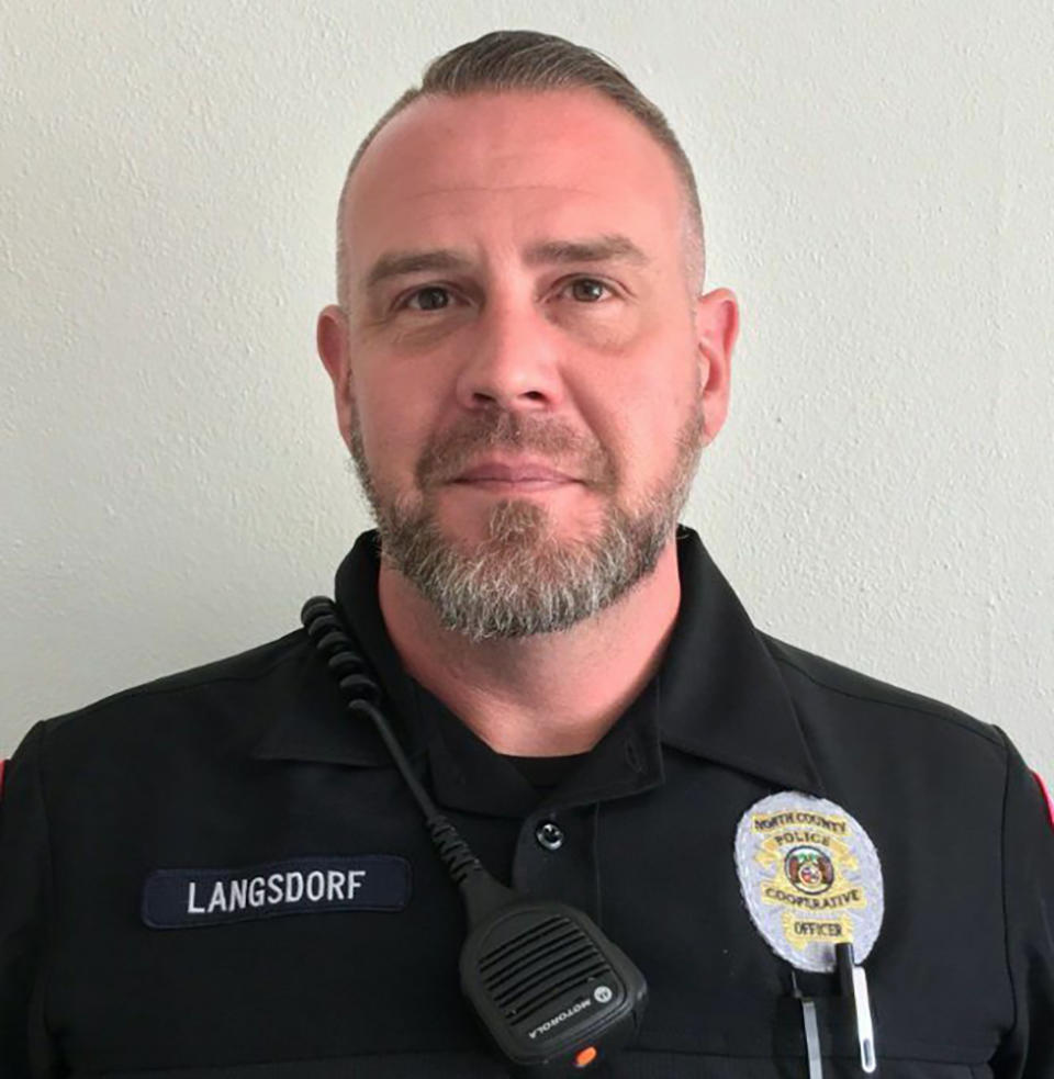 North County Police Cooperative officer Michael Langsdorf is shown in an undated photo provided by the North County Police Cooperative. Officer Langsdorf was shot and killed Sunday, June 23, 2019 in Wellston, Mo., near St. Louis while responding to a bad check complaint at a food market. (North County Police Cooperative via AP)