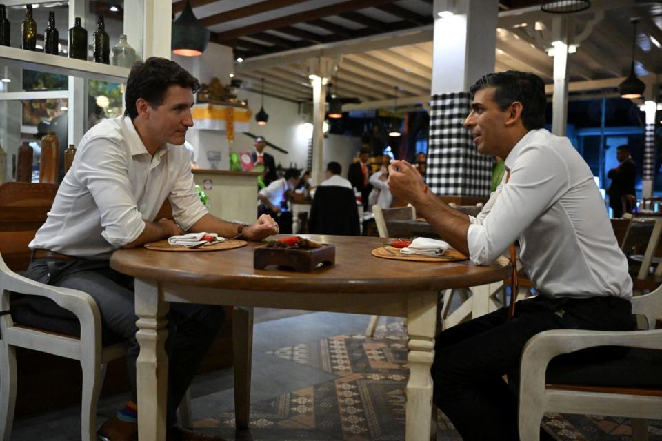 Canada's Prime Minister Justin Trudeau and British Prime Minister Rishi Sunak have a bilateral meeting at the Art Cafe Bumbu Bali, ahead of the G20 Summit (via REUTERS)