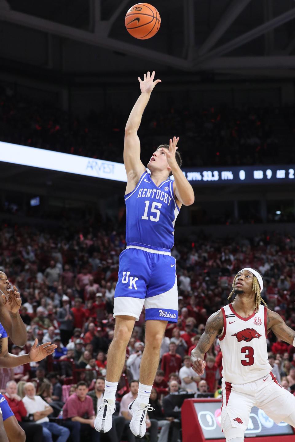 Kentucky freshman guard Reed Sheppard shoots in the first half against the host Razorbacks. Sheppard scored 14 points in the Wildcats' 63-57 victory Saturday night.
