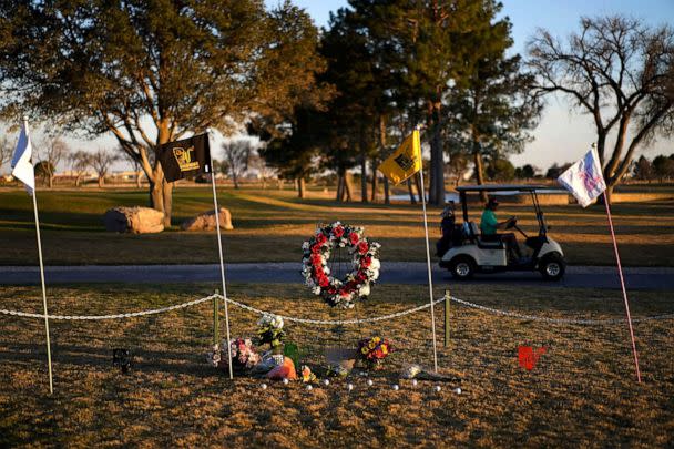 PHOTO: A golfer drives by a makeshift memorial at the Rockwind Community Links, on March 16, 2022, in Hobbs, N.M. (John Locher/AP, FILE)