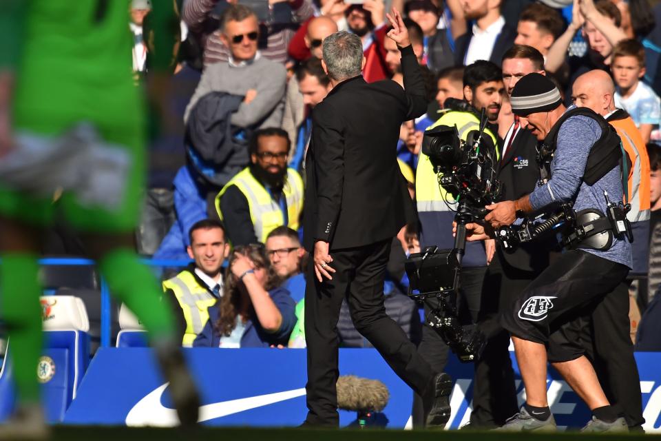 Jose Mourinho taunts Chelsea fans after his Manchester United team got a 2-2 draw at Stamford Bridge. (Getty)