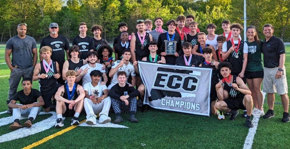 The Griswold boys track team celebrates after winning the ECC Division 3-4 championship at Griswold High School.