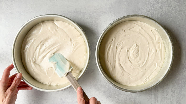 Chantilly cake batter in round cake pans