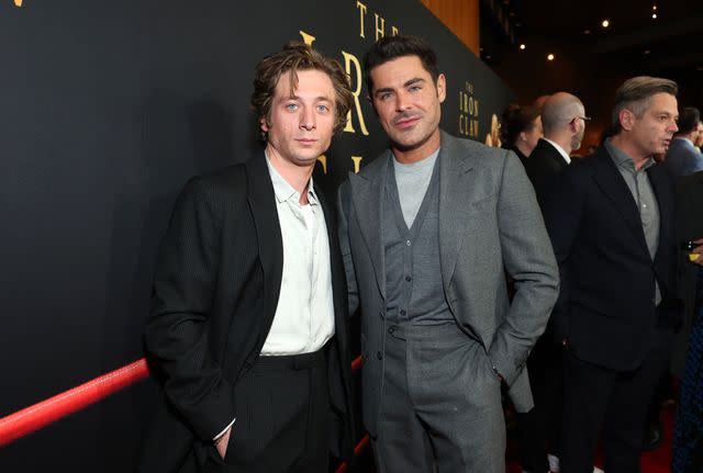 <p>Stewart Cook/Getty</p> Zac Efron and Jeremy Allen White attend the Los Angeles premiere of 'The Iron Claw'