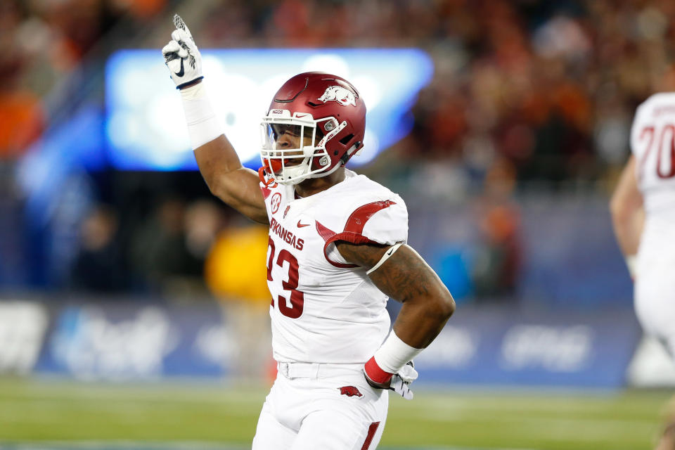 Dec 29, 2016; Charlotte, NC, USA; Arkansas Razorbacks linebacker Dre Greenlaw (23) celebrates after a fourth down stop in the first quarter against the Virginia Tech Hokies during the Belk Bowl at Bank of America Stadium. Mandatory Credit: Jeremy Brevard-USA TODAY Sports
