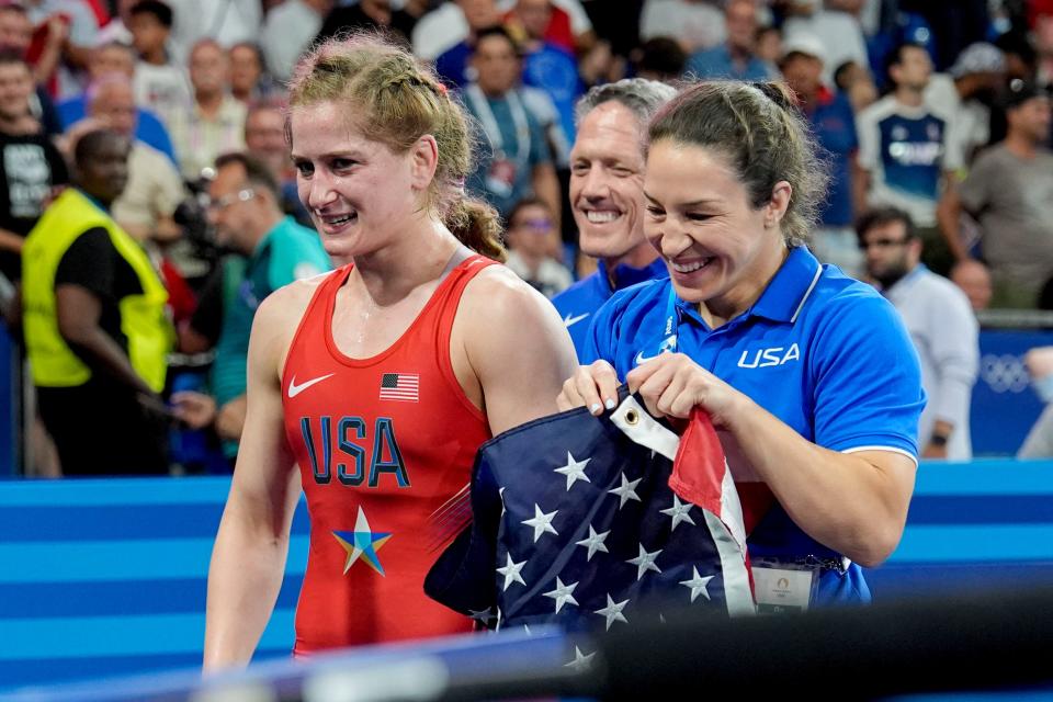 Aug 6, 2024; Paris, France; Amit Elor (USA) celebrates her win over Meerim Zhumanazarova (Kyrgyzstan) in the gold medal match during the Paris 2024 Olympic Summer Games at Champ-de-Mars Arena. Mandatory Credit: Sarah Phipps-USA TODAY Sports