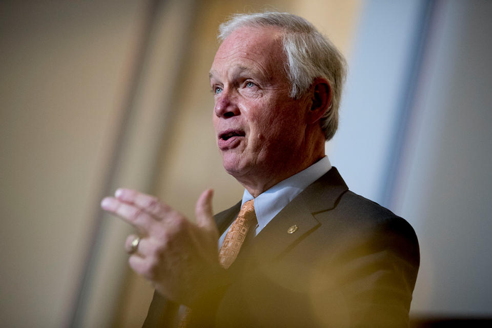 Chairman Sen. Ron Johnson, R-Wis., speaks to a reporter before the Senate Homeland Security and Governmental Affairs committee meets on Capitol Hill in Washington, Wednesday, May 20, 2020, to issue a subpoena to Blue Star Strategies. (AP Photo/Andrew Harnik)