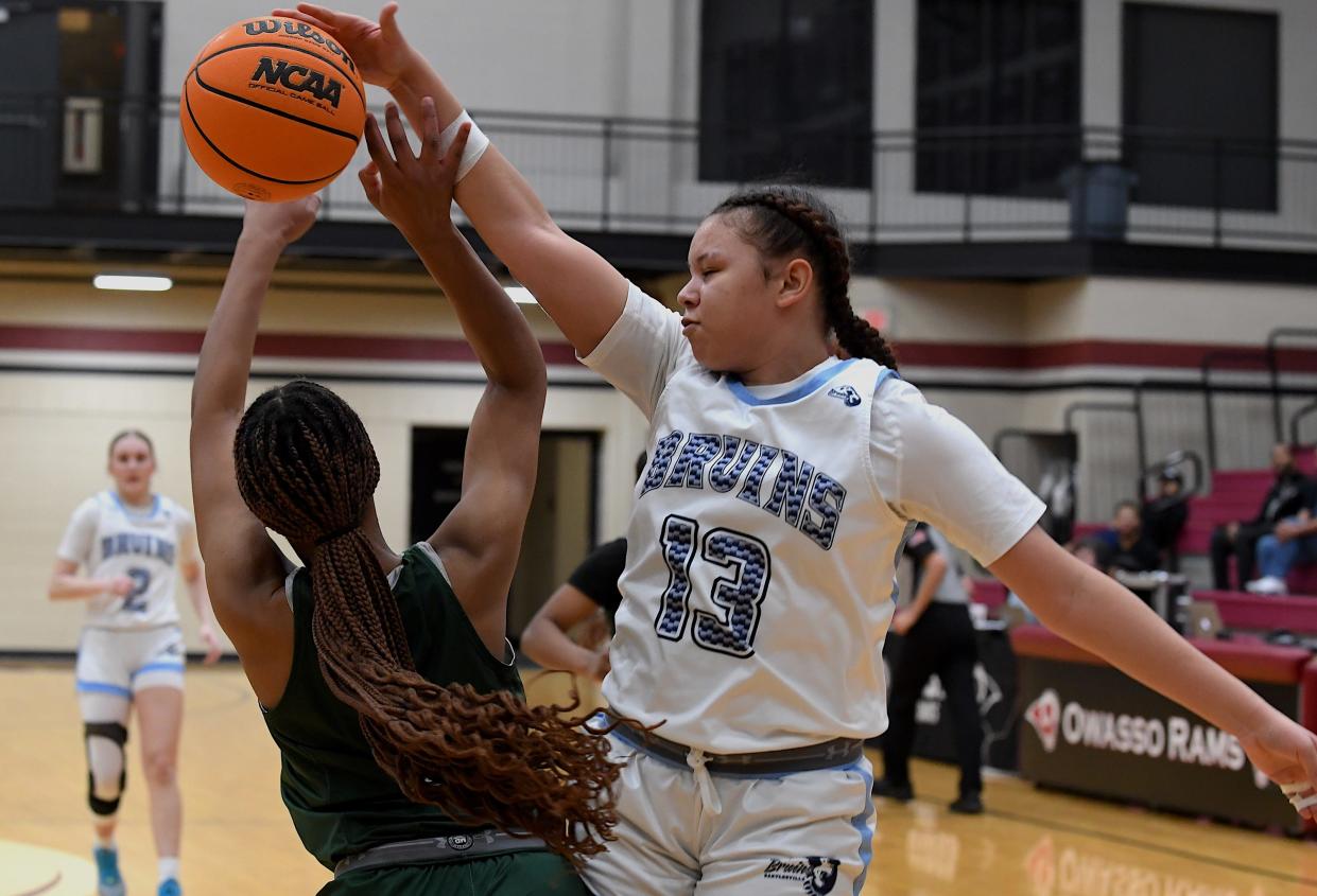 Bartlesville HIgh School's senior Mikka Chambers (13) goes after a rebound in basketball action against Muskogee in Owasso on Feb. 23, 2024. The Lady Bruins season ended on Saturday with a playoff loss.