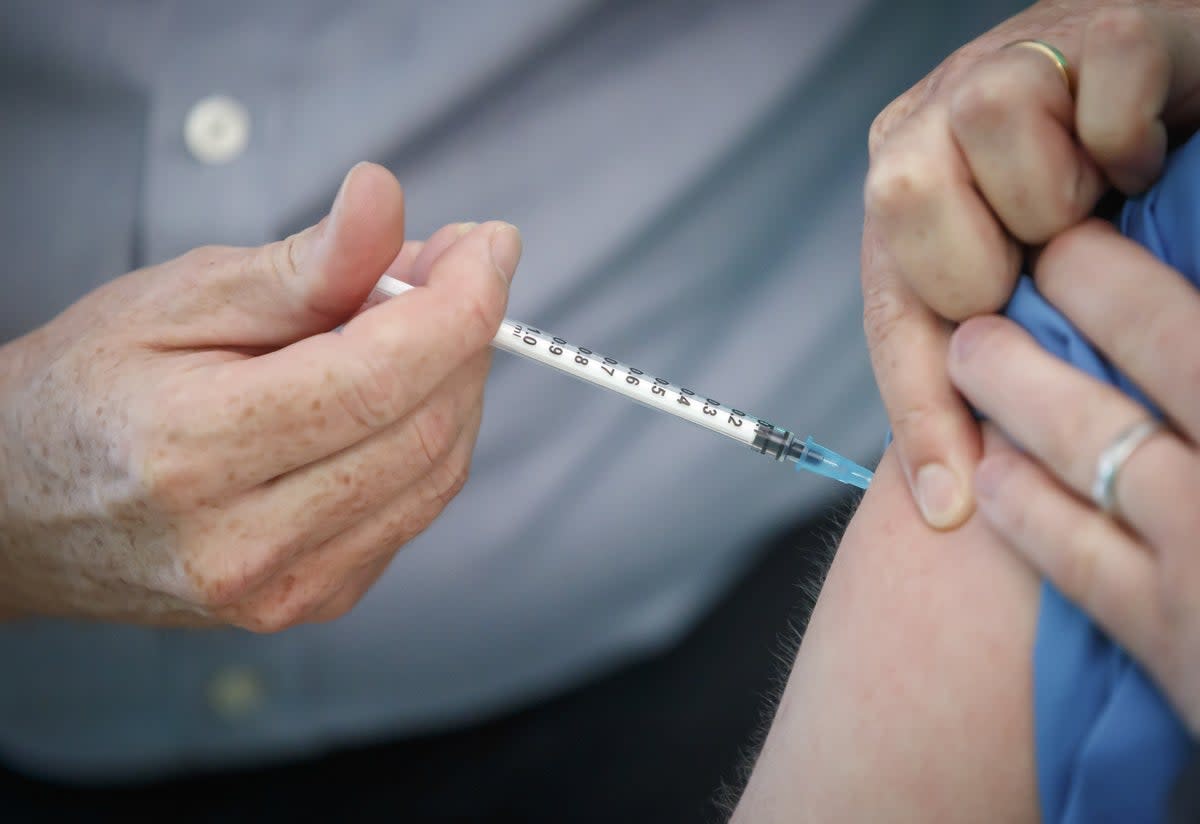 A Pfizer/BioNTech vaccine being administered (PA Archive)