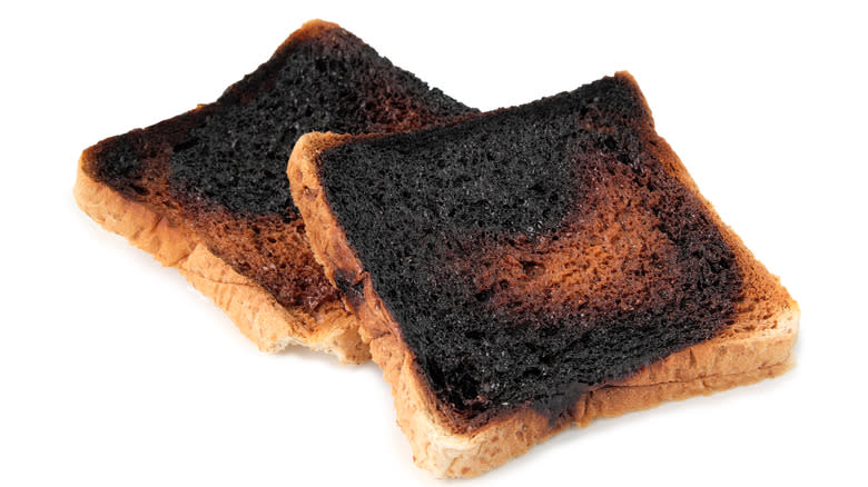 Two slices of burnt toast