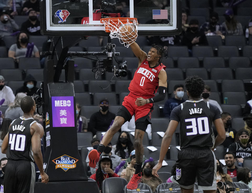 Houston Rockets rookie Jalen Green dunks against the Sacramento Kings on Jan. 16, 2022. He will compete in the NBA All-Star Slam Dunk contest this season. (Thearon W. Henderson/Getty Images)