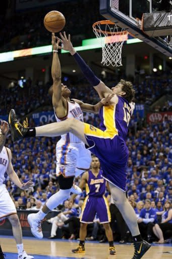 Oklahoma City Thunder's Russell Westbrook shoots as Los Angeles Lakers' Pau Gasol defends during game one of the NBA Western Conference series on May 14. Oklahoma City won 119-90