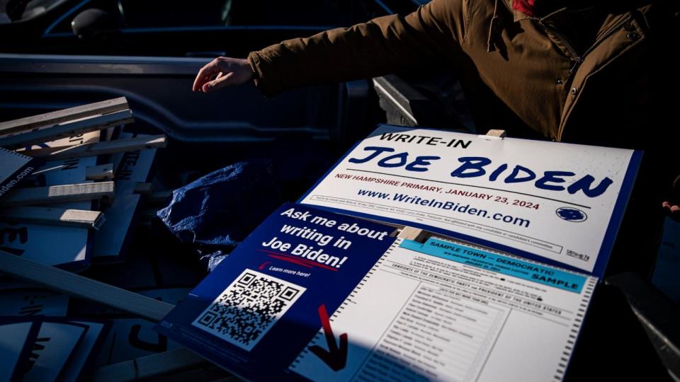 PHOTO: Campaign signs during a Write-In Joe Biden campaign 'Get Out The Vote' event in Dover, N.H., on Jan. 21, 2024.  (Al Drago/Bloomberg via Getty Images)