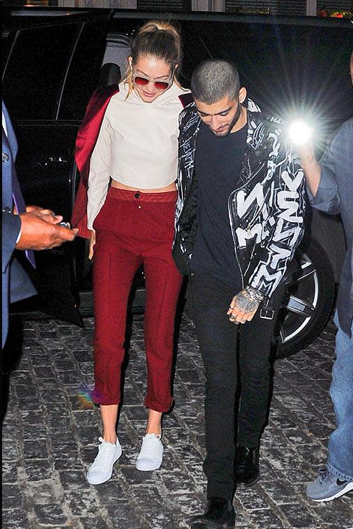 Here's another photo of Zayn and Gigi out and about looking like they've literally stepped out of a fashion magazine. <br><br> Credit: Splash