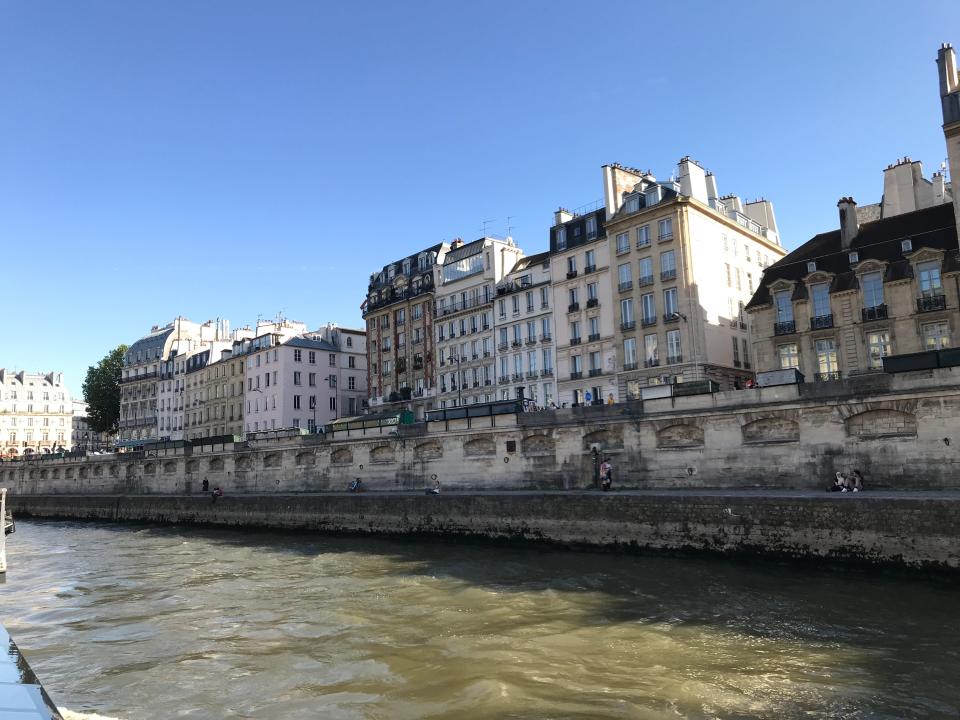 view from a boat sailing down the seine in paris