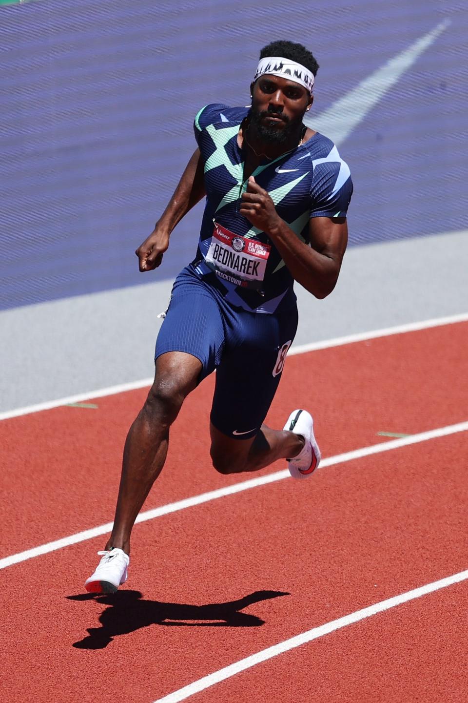 EUGENE, OREGON - JUNE 25: Kenny Bednarek competes in the first round of the Men's 200 Meters during day eight of the 2020 U.S. Olympic Track & Field Team Trials at Hayward Field on June 25, 2021 in Eugene, Oregon. (Photo by Patrick Smith/Getty Images)