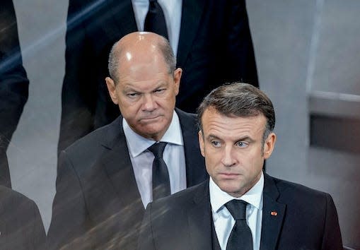 French President Emmanuel Macron, right, and German Chancellor Olaf Scholz, left, viewed unsmiling from above in Berlin on January 22, 2024.