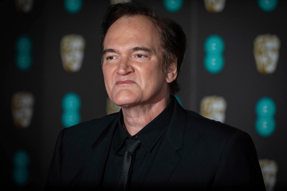 Quentin Tarantino brushed off criticism of his movies featuring excessive violence or racial slurs.