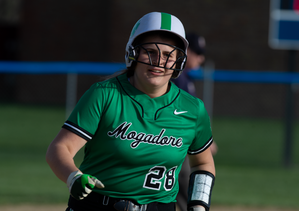 Olivia Kidd of Mogadore rounds third base after hitting a two-run home run in the sixth inning of a softball game at Rootstown on Tuesday, April 11, 2023.