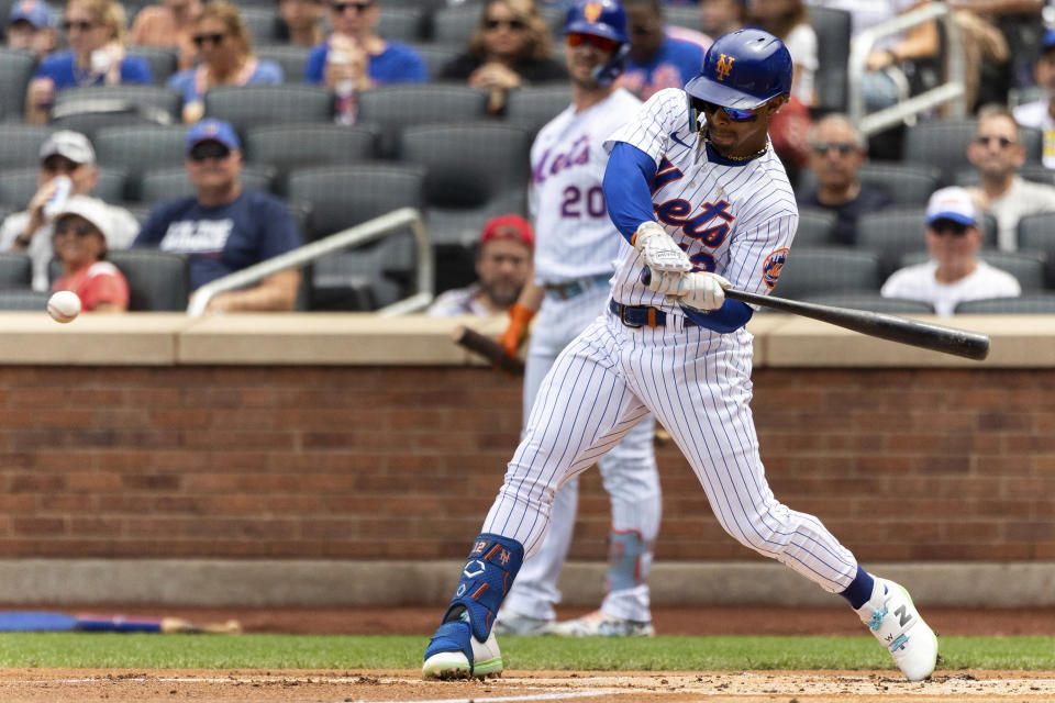 New York Mets' Francisco Lindor singles on a fly ball during the first inning of a baseball game against the Philadelphia Phillies, Sunday, Aug. 14, 2022, in New York. (AP Photo/Julia Nikhinson)