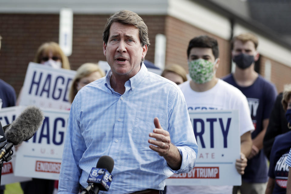 Former U.S. Ambassador to Japan Bill Hagerty speaks at a polling place Thursday, Aug. 6, 2020, in Brentwood, Tenn. Hagerty and Dr. Manny Sethi are competing to become the GOP nominee in the race to replace retiring Republican Sen. Lamar Alexander. (AP Photo/Mark Humphrey)